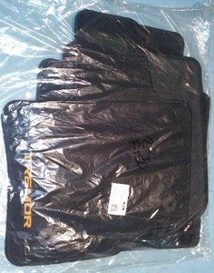 lot 526 image: OEM 21-25 F-150 TREMOR Black Crew Cab Carpet Floor Mats Embroidered Logo
