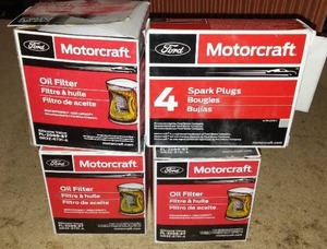 lot 562 image: Oil Filter - Ford (GR3Z-6731-A) (3). Spark Plug - Ford (AGSP-32F-SMX)