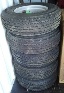 lot 613 image: Bridgestone Dueler AT RH-S All Terrain 25575R17 115T Light Truck Tire (5) Bronco Rims