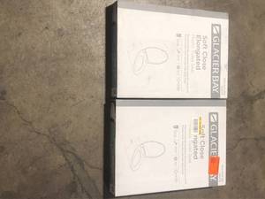 lot 35 image: Lot of  Glacier Bay Elongated Slow-Close Closed Front Toilet Seat in White  Customer Returns See Pictures