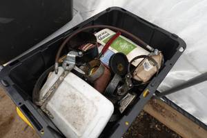 lot 760 image: Oil Filter Wrenches, Automotive Service Manuals