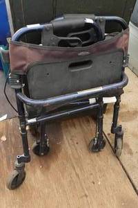 lot 750 image: Invacare Heavy Duty Folding Walker with Brake and Seat