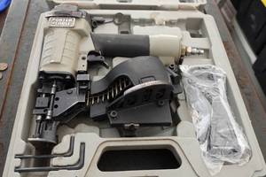 lot 727 image: Porter Cable Air Coil Roofing Nailer with Case