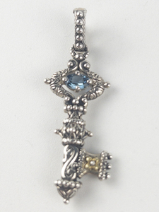 lot 24 image: Barbara Bixby Blue Topaz Key Sterling and 18K yellow gold Enhancer. Replacement Value $150