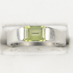 lot 64 image: Emerald Cut Peridot Sterling Silver Ring. Size 8 - 8.25.