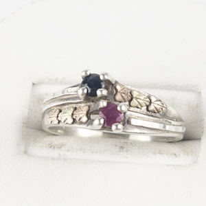 lot 82 image: Colman CCO  Ruby & Sapphire Rose & Yellow Leaves 12K & Sterling Silver Ring. Size 6.75 - 7.
