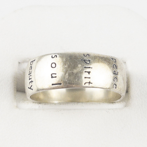 lot 84 image: Laurel Elliott Love, Joy, Beauty Etc. Sterling Silver Band. Size 8.5 - 8.75.