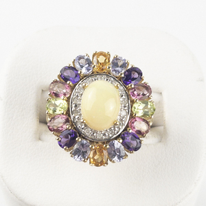 lot 94 image: Opal Cabochon With Rainbow Sepi Precious Gemstone Halo  Vermeil Cocktail Ring. Size 6 - 6.25.