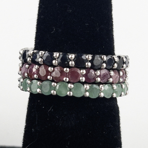 lot 100 image: Designs by FMC Ruby, Emerald, & Sapphire Sterling Silver Eternity Ring Set. Size 7 - 7.25.