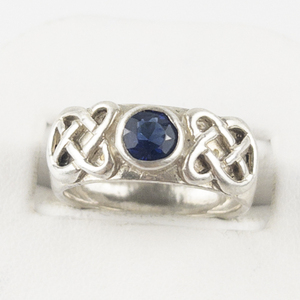 lot 104 image: Created Blue Sapphire Celtic Knot Sterling Silver Ring. Size 6.25 - 6.5.