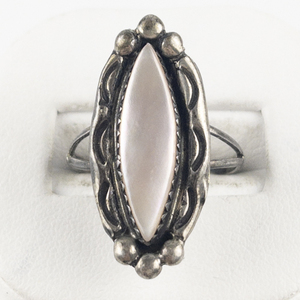 lot 105 image: Lawrence Baca () - Southwest Style  Elongated Pink Mother Of Pearl Sterling Silver Ring. Size 8 - 8.25.