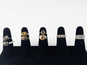 lot 110 image: Group of 11 Base Metal Rings. Size 6.75-7.25.
