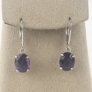 lot 124 image: Bangkok Ratnaraj Jewelers Oval Cut Amethyst Sterling Silver Lever Back Pierced Earrings .