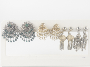 lot 141 image: Group of 4  Base Metal Non-Pierced Earrings.