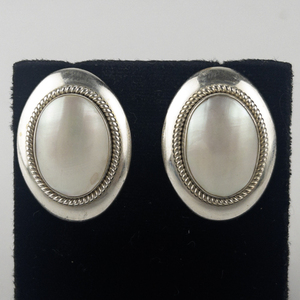lot 145 image: Waldeck Jewelers  Mother Of Pearl Oval Cabochon Sterling Silver Pierced Earrings .