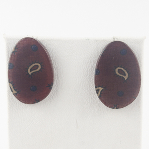 lot 147 image: Paisley Resin Base Metal Pierced Earrings .