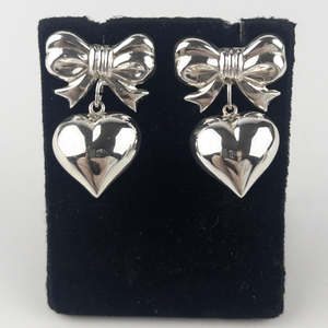 lot 157 image: Cute Trendy Puffy Heart & Bow Sterling Silver Dangle Earrings .