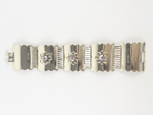 lot 174 image: Floral Rhinestone Gold Tone Base Metal Panel Bracelet.