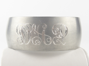 lot 177 image: Dhp Monogram Pewter Cuff Bracelet.