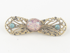 lot 226 image: Turquoise & Simulated Pink Opal Filigree Gold Tone Base Metal Brooch .