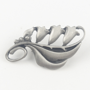 lot 236 image: Rune Tennesmed  Floral Leafy Pewter Brooch .