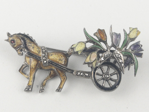 lot 254 image: EB Germany  Horse & Trailer Of Flowers Base Metal Brooch .