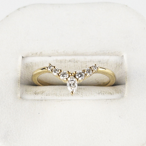 lot 2 image: 14k Yellow Gold Chevron Wedding band set with 15ct Total of Natural Accent Diamonds. Estimated Replacement Value $1400