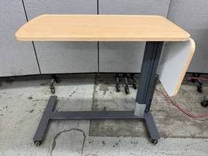 lot 15 image: Intensa&nbspHeight Adjustable & Mobile&nbspOverbed Table&nbspTV Tray Workstation&nbspWith Heavy Duty Steel &nbspLow Profile&nbspBase&nbspLaminated Dual Top, Flip Up Side Table With Cup and has a weight capacity of 100 lbs  