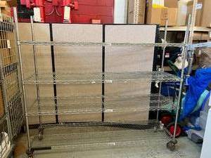 lot 45 image: 4-Tier Adjustable Chrome-Plated Wire Shelving Storage Rack - NSF Approved - Wheels have no rubber left on them Would make great stationary shelving  (67 x 70.5 x 21)