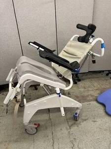 lot 42 image: MSRP $3500 Aquatec Ocean VIP XL&nbspTilt-in-space and Recline Rolling Shower, Pool & Commode Chair - Good Condition - Does Not Seem To Sit All The Way Up
