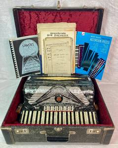 lot 10 image: Vintage Fratelli Carlona Piano Accordion White Mother of Pearl Keys plus Case