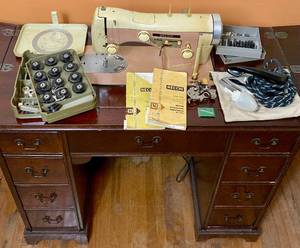 lot 157 image: Vintage Necchi Supernova Ultra Automatic Sewing Machine in cabinet with box of Standard Accessories and Necchi Sewing Machine Attachments