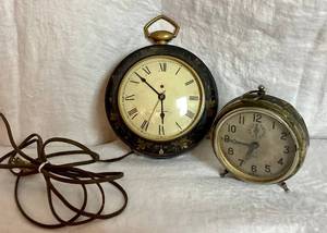lot 29 image: Antique Clocks - Liberty Alarm Clock and Seth Thomas Black Black Floral Wall Clock