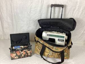 lot 48 image: Brother XR - 37 Sewing Machine, Wheeled Traveling Case and Sewing Box with supplies