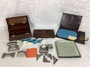 lot 36 image: Collection of Desk Writing Sets and Heavy Glass Pressing Pad. Pewter Desk Set, Leather Desk Set from 1890 and Wood Set with pens.
