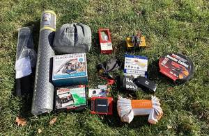 lot 172 image: Car Care Bundle - Chargers, Booster Cables, Black & Decker Dust Buster, Car Cover, Frost Guard, Fatique Mat and more
