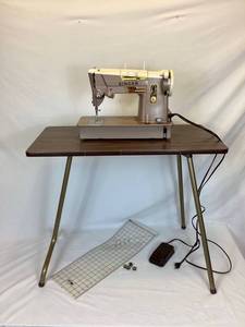 lot 181 image: Vintage Singer 328K Metal Sewing Machine with Pedal