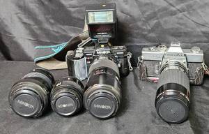 lot 28 image: Vintage Minolta SLR Cameras and Lenses. Model 1 - Maxxum 7000, Model 2 - SRT101, includes 5 Lenses