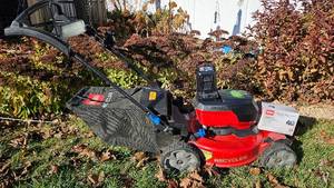 lot 9 image: Toro Battery Operated 60V Max Flex Force Brushless Motor Lawn Mower includes charger, 2 batteries and bagger