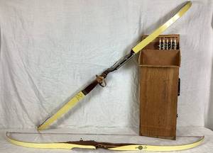 lot 206 image: Two Recurve Bows - Black Widow 101 Handcrafted by Wilson Bros. 68 Bow #15789 and Silver Sovereign by Ben Pearson Tartan #1009 64 Bow