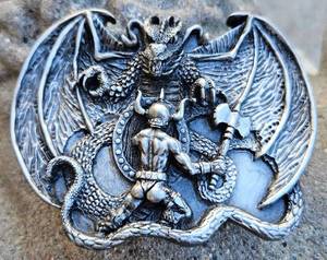 lot 240 image: Concrete Gargoyle and Vintage Bergamot Brass Works T-48 Dragon Warrior Belt Buckle