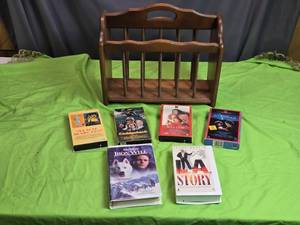 lot 22 image: Collection of 6 VHS Movies with Wooden Magazine Holder