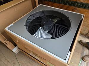 lot 44 image: New in Box Ruud 2.5 Ton Air Conditioner System - Outdoor Unit