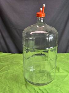 lot 70 image: Glass Carboy with Orange Cap for Fermentation - 23 Inches Tall