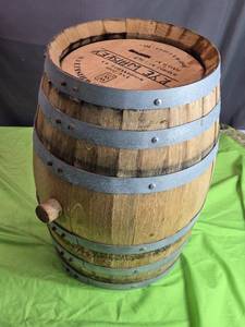 lot 95 image: Wood Whiskey Barrel with Metal Bands