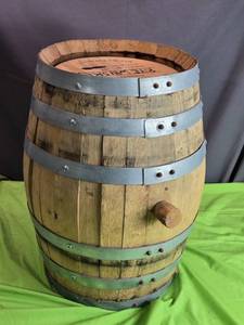 lot 96 image: Authentic Wooden Whiskey Barrel with Metal Hoops - Decorative or Functional Use
