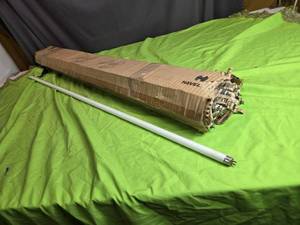lot 199 image: Used GE EcLux High Efficiency 2W Fluorescent Light Bulbs - Tube Collection