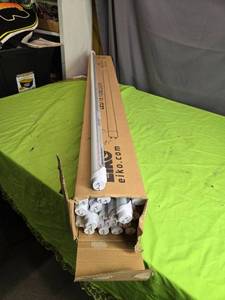 lot 202 image: Box of 21 Used 4-Foot LED Tube Lights by Elko