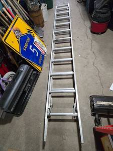 lot 215 image: Aluminum Extension Ladder 12 Feet when Not extended
