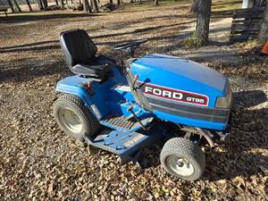 lot 2D image: Ford GT95 Lawn Tractor with Snow Blower, Brush, Snow Blow  Dirt Blade - 804 Hrs.
